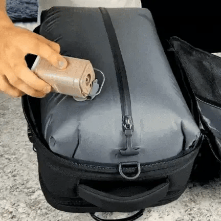 Electric pump attached to the bag's valve, drawing the air out