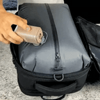 Electric pump attached to the bag's valve, drawing the air out